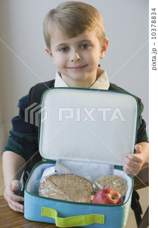 Boy with lunch box 10378834