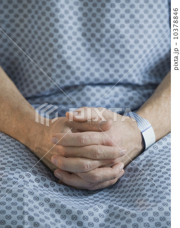 Man in hospital gown Man in hospital gown 10378846