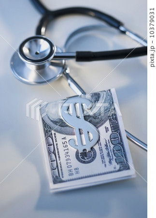 Money in clip and stethoscope 10379031