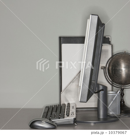 Computer and globe on office desk Computer and globe on office desk 10379067