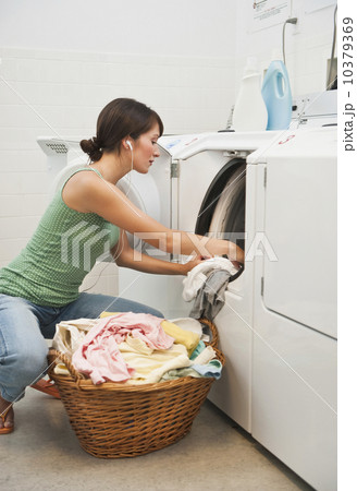 Woman washing clothes Woman washing clothes 10379369