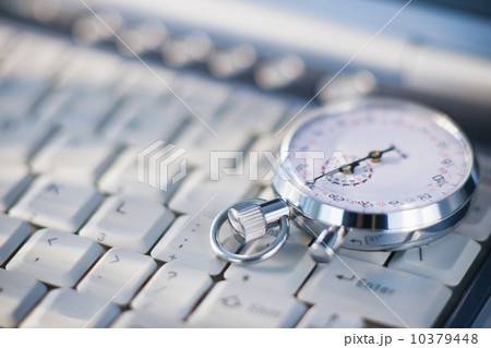 A compass on a computer keyboard 10379448