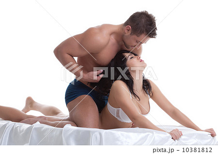 Foreplay of young lovers lying in bed Foreplay of young lovers lying in bed 10381812