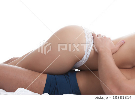 Contact of male and female hips, close-up 10381814