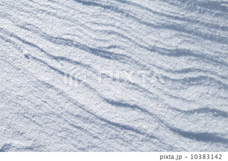 Texture of hilly snowdrift with nice shadows 10383142
