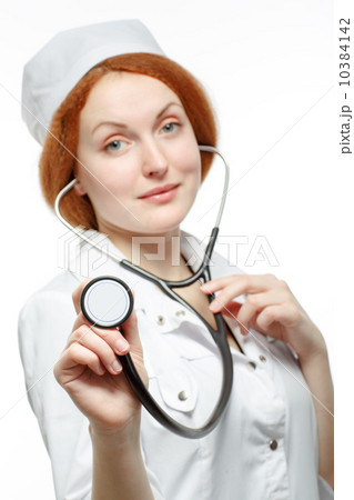 Female doctor with stethoscope, isolated on white 10384142