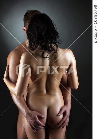 Portrait of embracing naked sexual partners 10386799