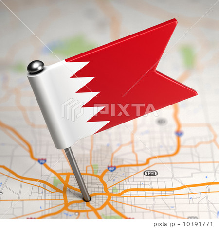 Bahrain Small Flag on a Map Background. Bahrain Small Flag on a Map Background. 10391771