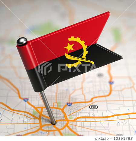 Angola Small Flag on a Map Background. 10391792