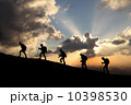 climbers on the sunset background 10398530
