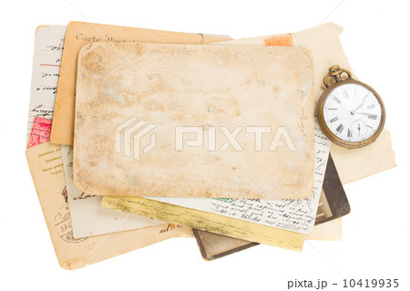 bunch of old photos and papers with antique clock bunch of old photos and papers with antique clock 10419935