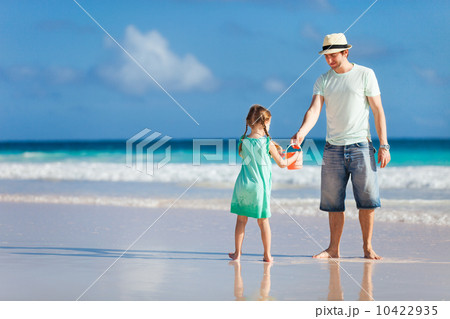 Father and daughter on a beach Father and daughter on a beach 10422935