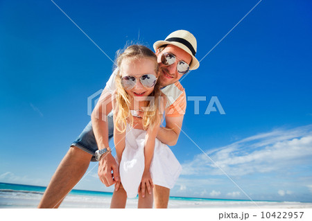 Father and daughter at beach 10422957