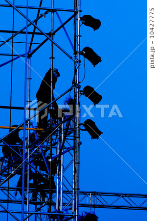 Silhouette of Workers in Blue Background 10427775