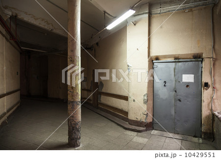 Empty dark industrial hall interior with metal elevator door Empty dark industrial hall interior with metal elevator door 10429551