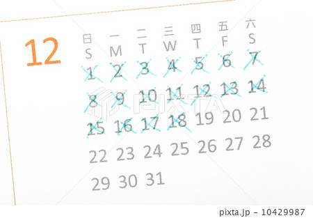 Close up of a white calendar page on December Close up of a white calendar page on December 10429987