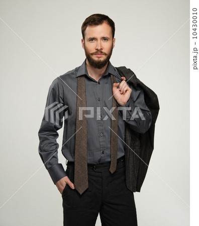 Handsome man with jacket over his shoulder 10430010