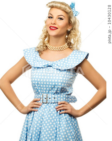 Sexy blond pin up style young woman in blue dress Sexy blond pin up style young woman in blue dress 10430128
