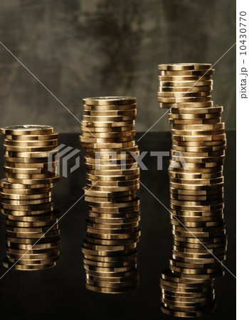 Three piles of golden coins Three piles of golden coins 10430770