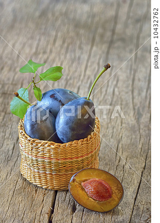 basket with plums basket with plums 10432762