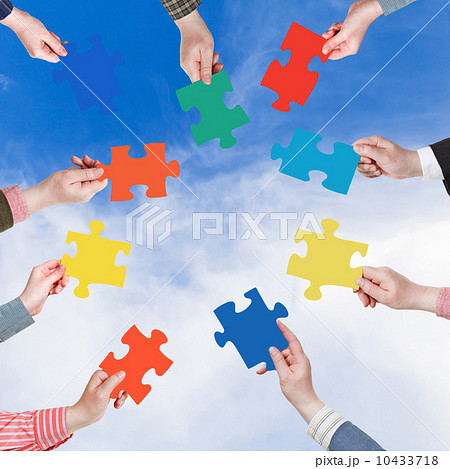 people hands with puzzle pieces with white cloud people hands with puzzle pieces with white cloud 10433718