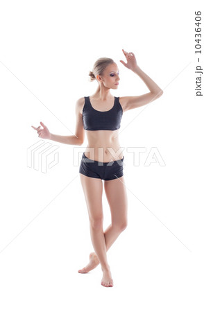 Beautiful slim athlete isolated on white backdrop Beautiful slim athlete isolated on white backdrop 10436406