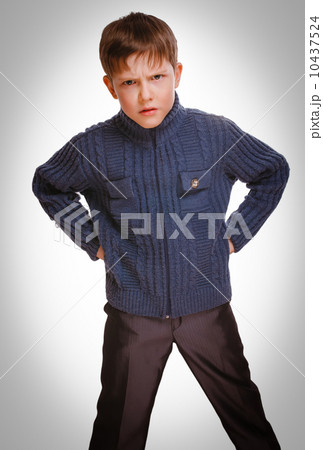 gray restless evil angry kid gloomy blond boy in striped sweater 10437524