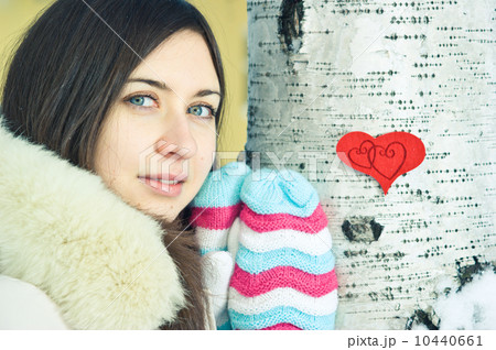 Teen girl heart in his hands 10440661