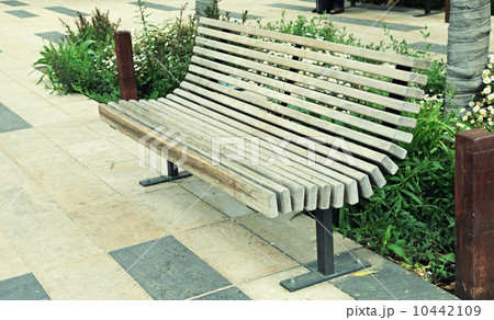 modern wood bench on the city street modern wood bench on the city street 10442109