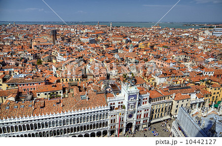 View to famous clocktower from campanille at San Marco place in Venice View to famous clocktower from campanille at San Marco place in Venice 10442127