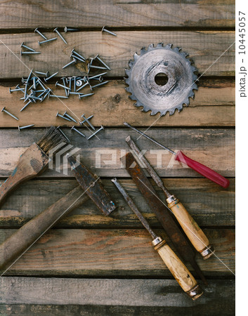 set of tools on a wooden background set of tools on a wooden background 10445057