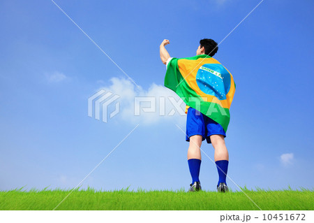 Excited man holding a brazil flag Excited man holding a brazil flag 10451672