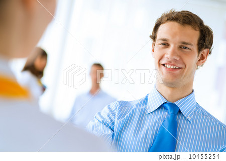 businessman shaking hands with a colleague businessman shaking hands with a colleague 10455254