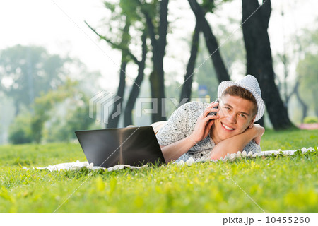 young man with a cell phone young man with a cell phone 10455260