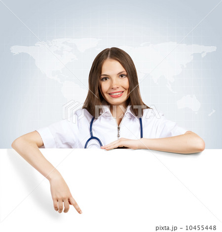 young woman doctor with a blank banner young woman doctor with a blank banner 10455448