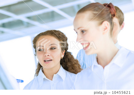 businessmen are meeting near the flipchart businessmen are meeting near the flipchart 10455621