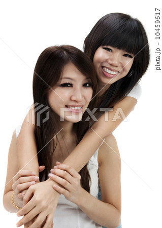 Asian sisters Asian sisters 10459617