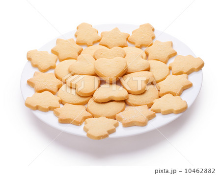 cookies with different shapes on plate isolated on white backgro cookies with different shapes on plate isolated on white backgro 10462882