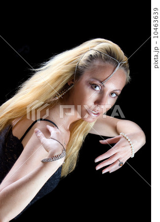 Beautiful young woman with ornaments in east style Beautiful young woman with ornaments in east style 10463639