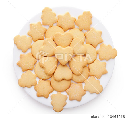 cookies with different shapes on plate isolated on white backgro cookies with different shapes on plate isolated on white backgro 10465618