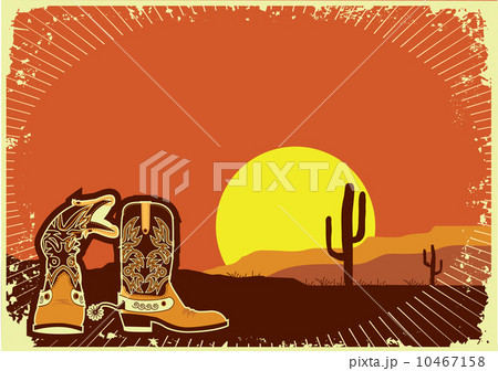 Cowboy boots.Grunge wild western background of sunset 10467158