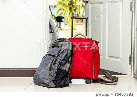red travel bag , backpack and shoes red travel bag , backpack and shoes 10467532