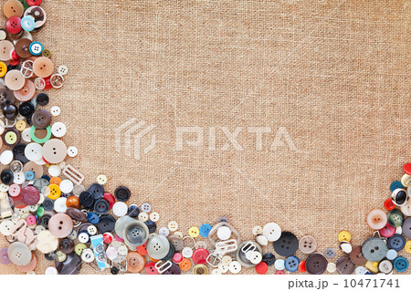 Buttons frame on fabric texture background Buttons frame on fabric texture background 10471741