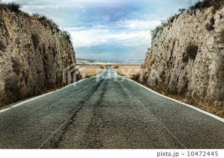 Old dramatic asphalt road 10472445