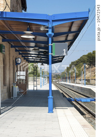 Railway station and railroad rails 10472543