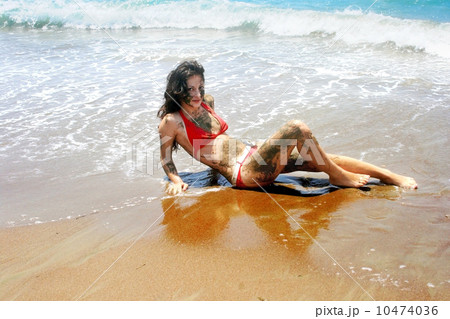 Dirty girl on beach 10474036