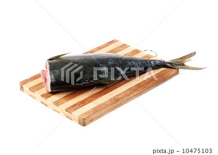 raw tuna un the cutting board isolated on white 10475103