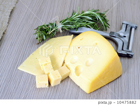 Cheese on Wooden Background 10475882