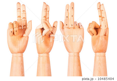 wooden hand is showing two fingers wooden hand is showing two fingers 10485404