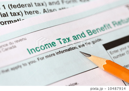 Income tax form and pen Income tax form and pen 10487914